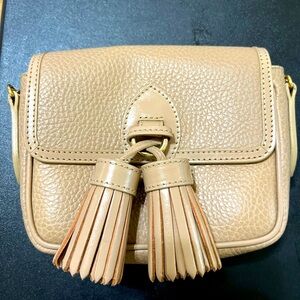 The Burberry Beige Leather Tassel Crossbody Bag